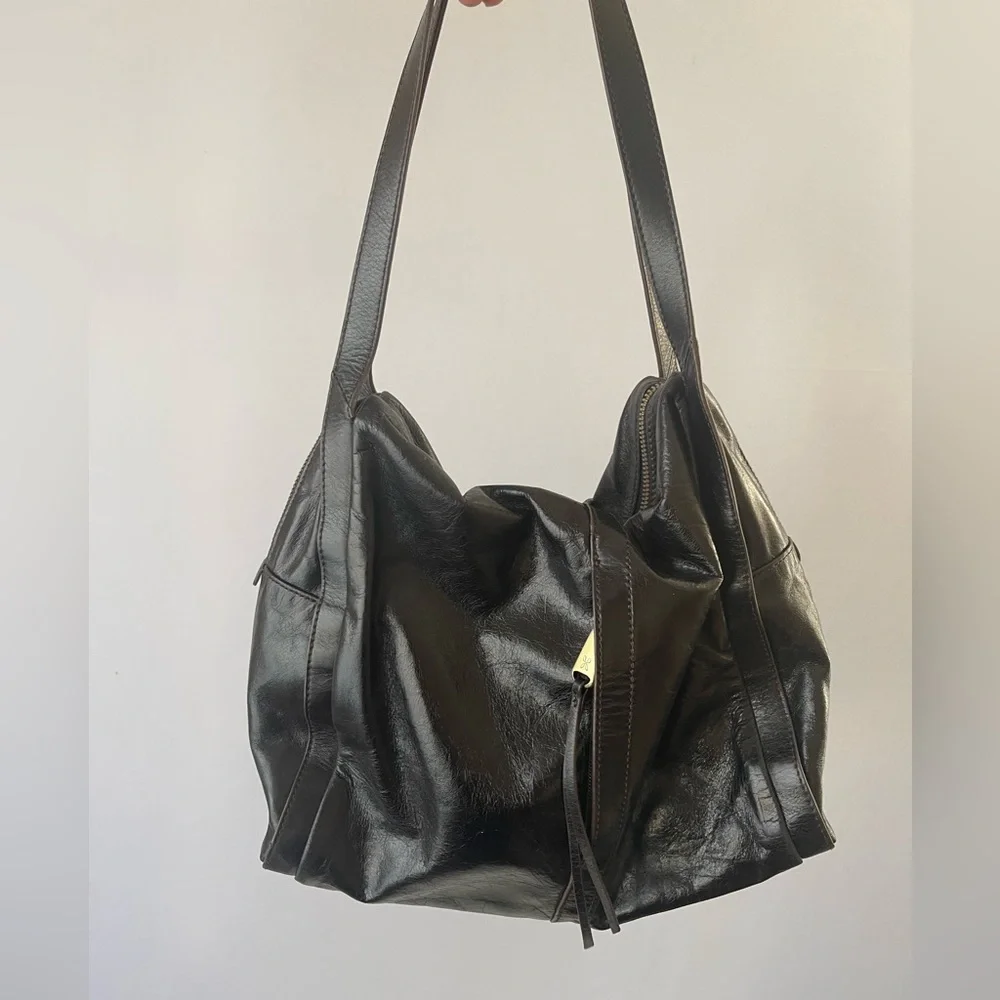 HOBO Slouchy Leather Bag With Tassels and Brass Hardware